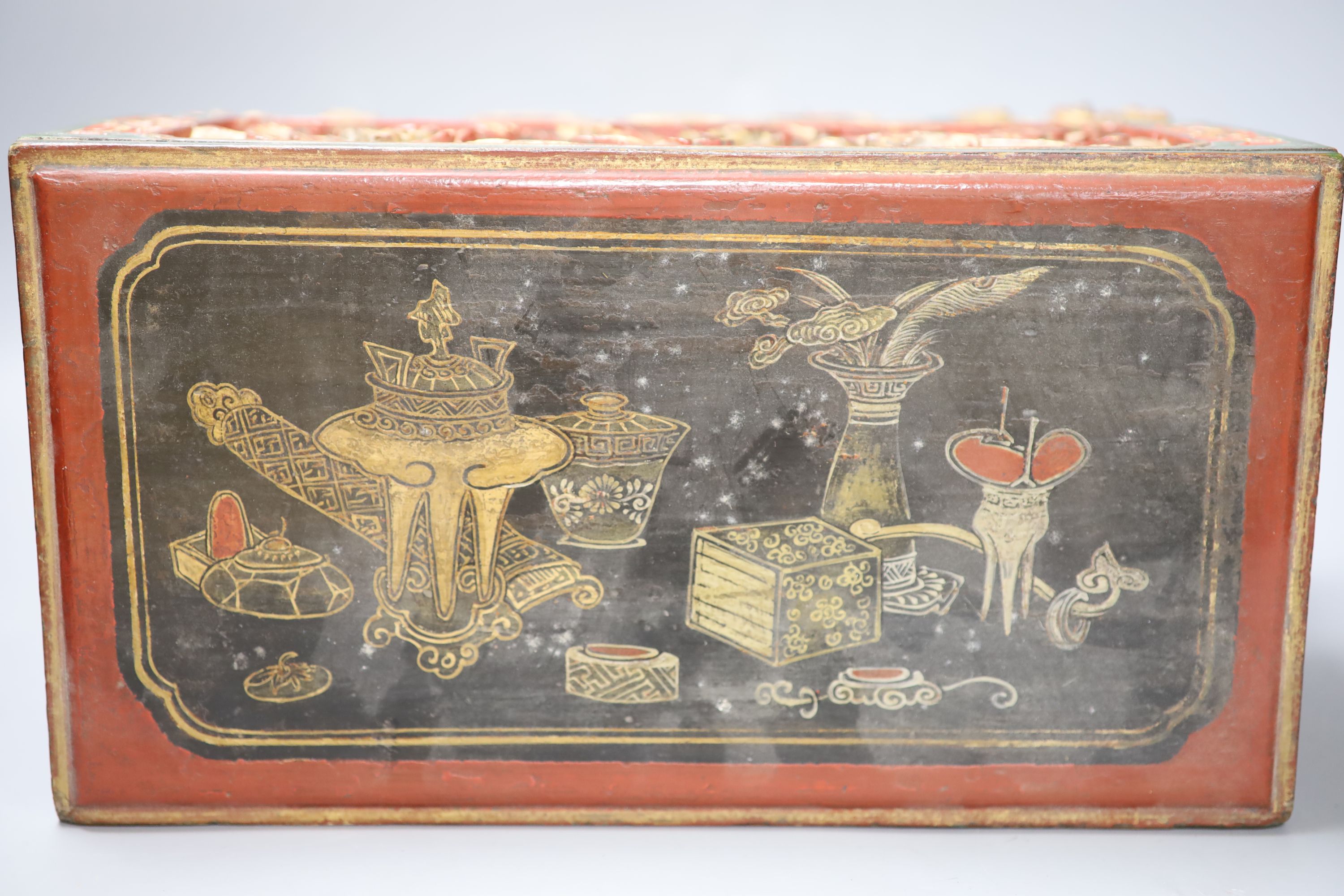 A 19th century Chinese red lacquer and gilt offering box (chanab), length 33cm